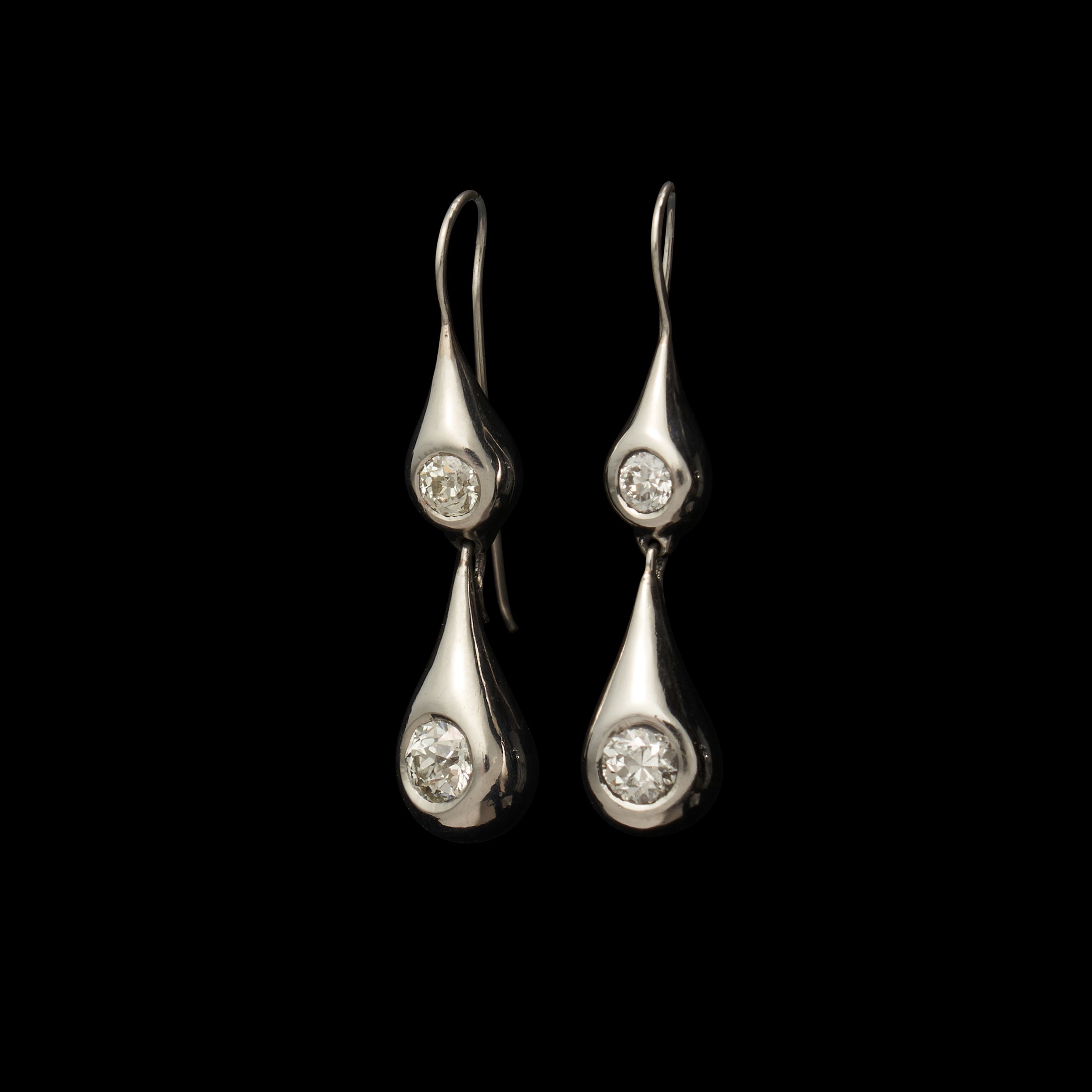 Double Platinum Solitaire Earrings